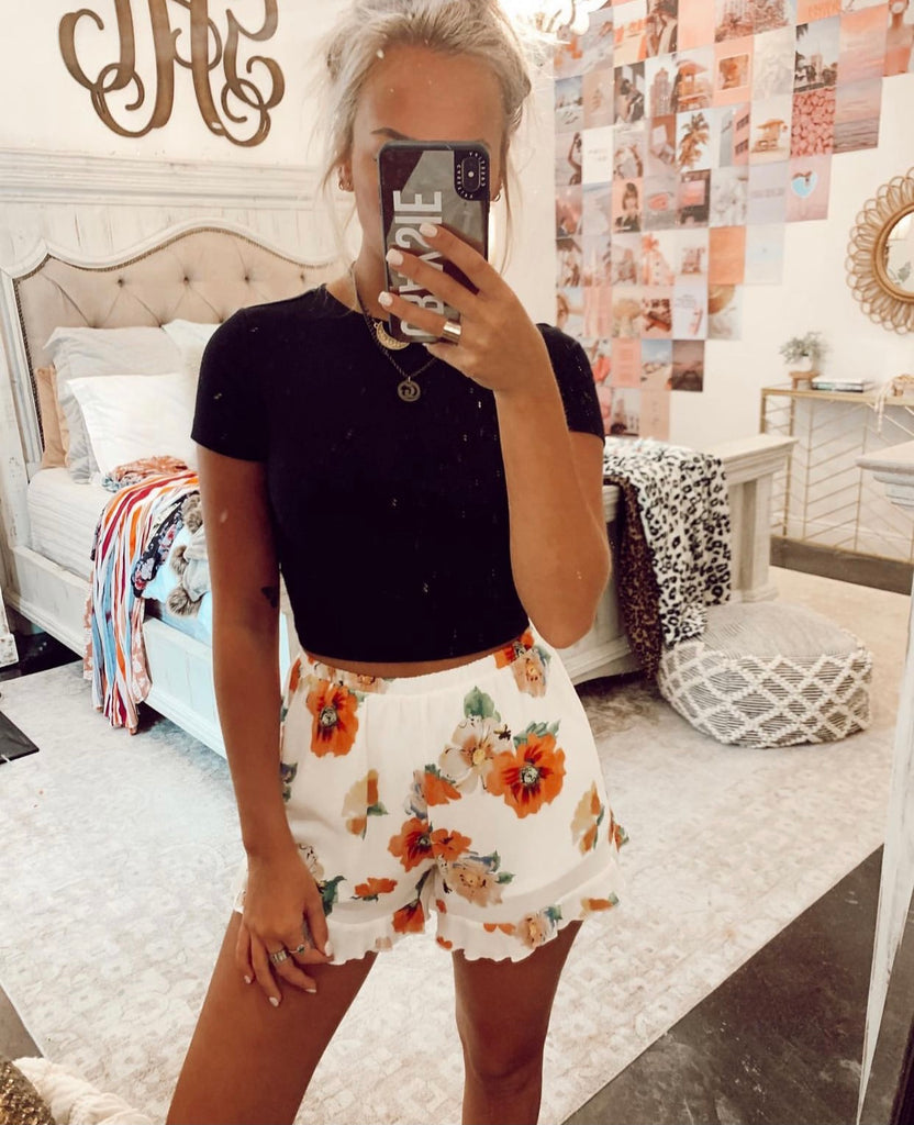 orange flower shorts
